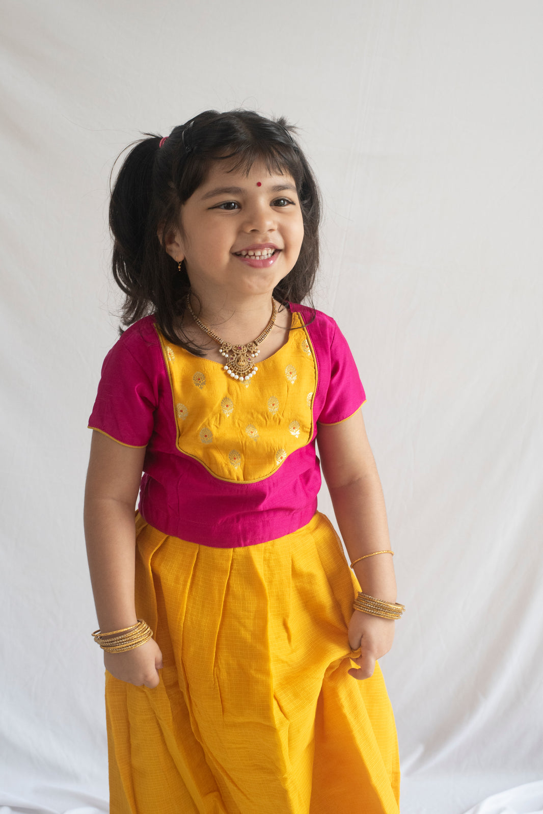 Gauri Pattu Pavadai | Peach & Orange